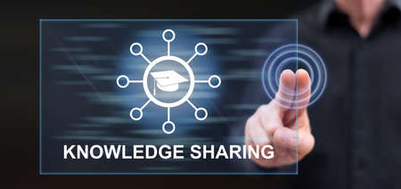 Man touching a knowledge sharing concept on a touch screen with his fingersの写真素材
