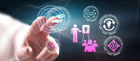 Woman touching a knowledge sharing concept on a touch screen with her finger