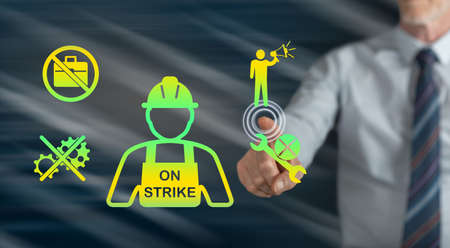 Man touching a strike concept on a touch screen with his finger