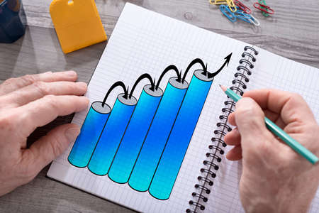 Growth concept drawn on a notepad placed on a deskの写真素材