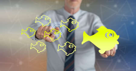 Man touching an influencer concept on a touch screen with his fingersの写真素材