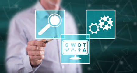 Man touching a swot concept on a touch screen with a penの写真素材