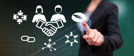 Woman touching a friendship concept on a touch screen with her finger