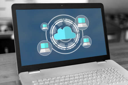 Laptop screen with cloud computing concept