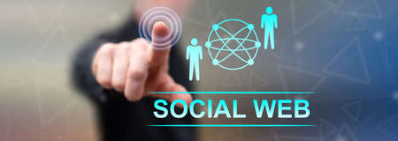 Man touching a social web concept on a touch screen with his fingerの写真素材