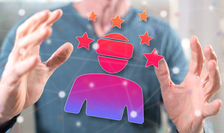 Virtual reality concept between hands of a man in backgroundの写真素材