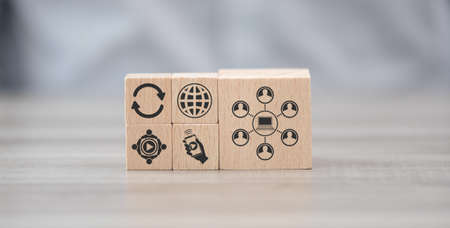 Wooden blocks with symbol of online meeting conceptの写真素材