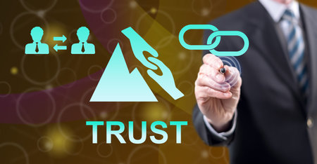 Man touching a trust concept on a touch screen with a stylus penの写真素材