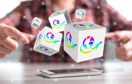 Smartphone with travel concept between hands of a woman in backgroundの写真素材
