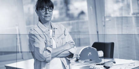 Portrait of middle aged female architect looking at the camera, geometric pattern