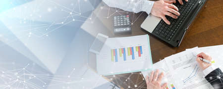 Businesspeople working together at office; panoramic banner