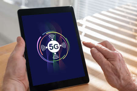 Tablet screen displaying a 5g conceptの写真素材