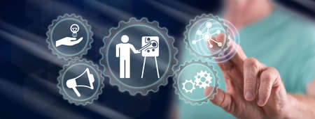 Man touching a coaching concept on a touch screen with his fingerの写真素材