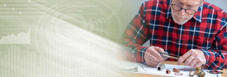 Plumber preparing a copper tube before welding; panoramic bannerの写真素材