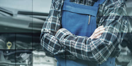 Car mechanic with arm crossed, geometric patternの写真素材