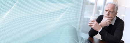 Portrait of thoughtful senior businessman at office; panoramic banner