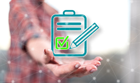 Document validation concept above the hand of a woman in backgroundの写真素材