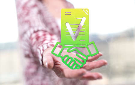 Deal concept above the hand of a woman in background