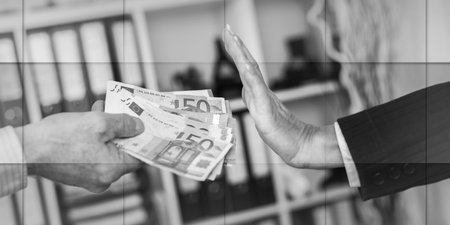 Woman hand rejecting an offer of money, geometric patternの写真素材