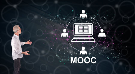 Businessman showing a mooc concept on a wall screenの写真素材