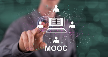 Man touching a mooc concept on a touch screen with his fingerの写真素材