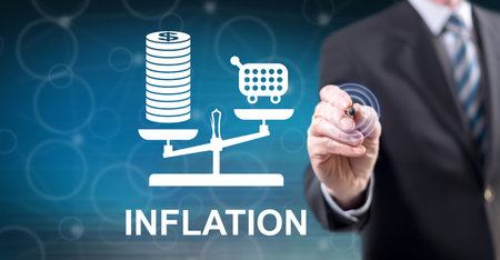 Man touching an inflation concept on a touch screen with a stylus penの写真素材