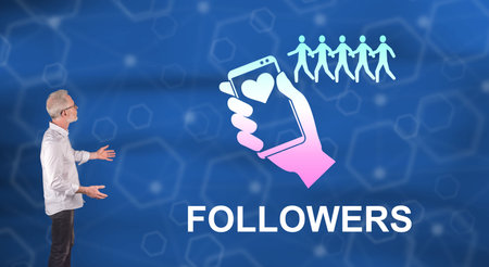 Businessman showing a followers concept on a wall screenの写真素材