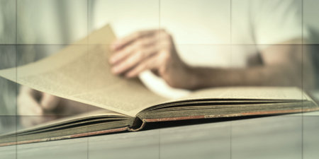 Man sitting reading a book, geometric pattern