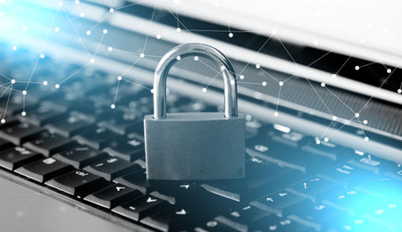 Computer security concept with a padlock on a keyboard; light-effect
