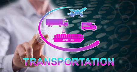 Man touching a transportation concept on a touch screen with his fingerの写真素材