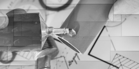 Plumber putting glue on a pvc pipe, closeup, geometric pattern