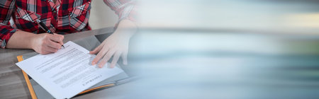 Woman hands signing a contract; panoramic banner