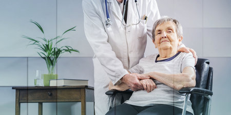 Doctor comforting senior woman, geometric patternの写真素材