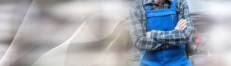 Car mechanic with arm crossed; panoramic bannerの写真素材