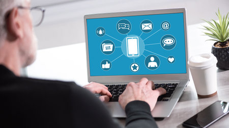 Laptop screen displaying a mobile apps conceptの写真素材