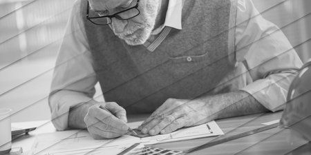 Architect working on a project and using a square, geometric patternの写真素材