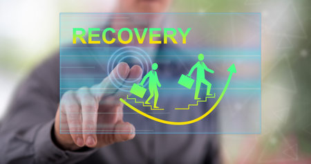 Man touching a recovery concept on a touch screen with his finger