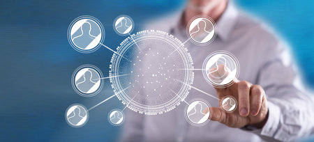 Man touching a social network concept on a touch screen with his finger