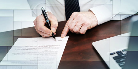 Hand of businessman signing a contract (lorem ipsum text used), geometric patternの写真素材
