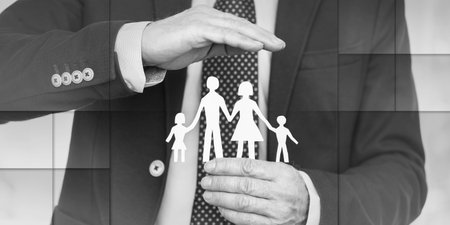 Insurer protecting a family, concept of insured family, geometric patternの写真素材