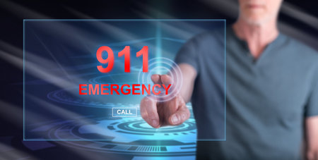 Man touching an emergency concept on a touch screen with his finger