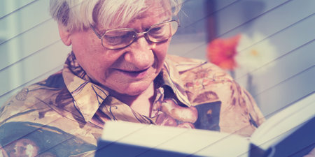 Old woman reading a book at home, geometric pattern