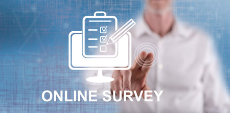 Man touching an online survey concept on a touch screen with his fingerの写真素材
