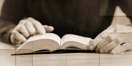 Man sitting and reading a book, geometric pattern
