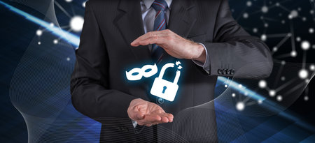Theft insurance concept with businessman in a protective gestureの写真素材