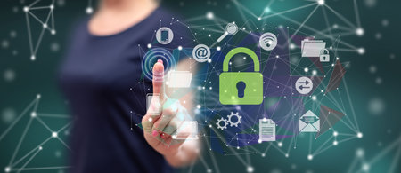 Woman touching a network safety concept on a touch screen with her finger