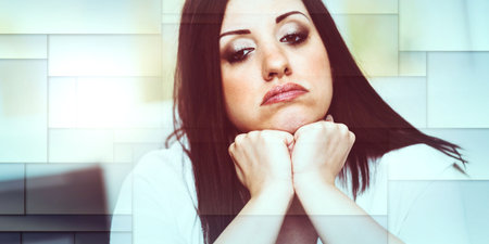 Portrait of depressed attractive young woman, geometric patternの写真素材