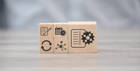 Wooden blocks with symbol of workflow concept