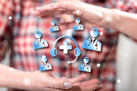 Online medical support concept between hands of a woman in backgroundの写真素材