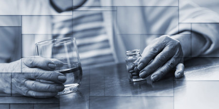 Elderly woman taking her medicine at home, geometric patternの写真素材